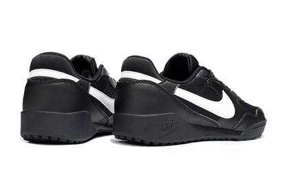 Chuteira Nike Terra Manta Society